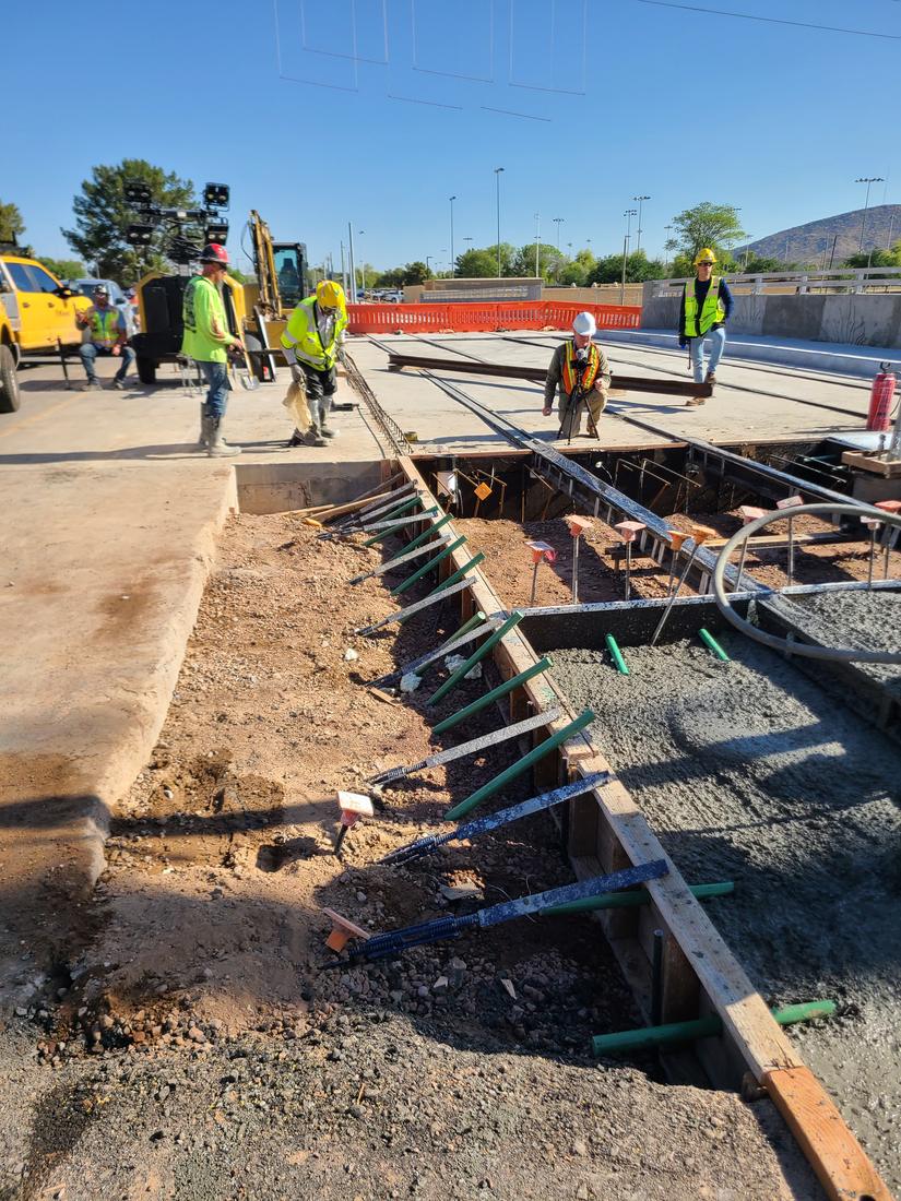 Formwork and rails in their rubber boots ready for the fiber concrete, North Mountain behind